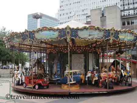 Carousel in front of Montparnasse station in Paris